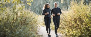 Two students following a running route through Sefton Park